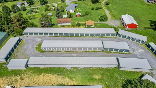 Aerial view of gravel road storage units.