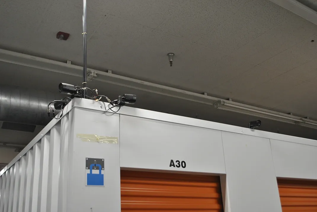 Indoor storage units with security cameras.