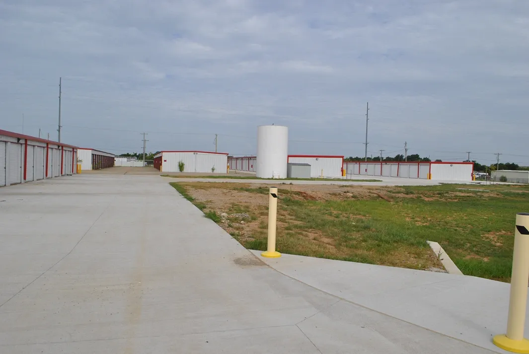 Paved entrance to storage facility.