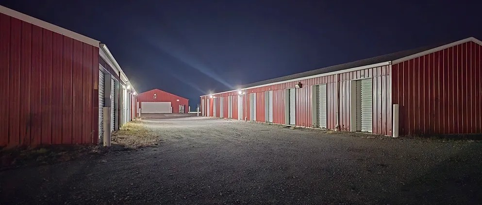 Well lit small outdoor storage units.