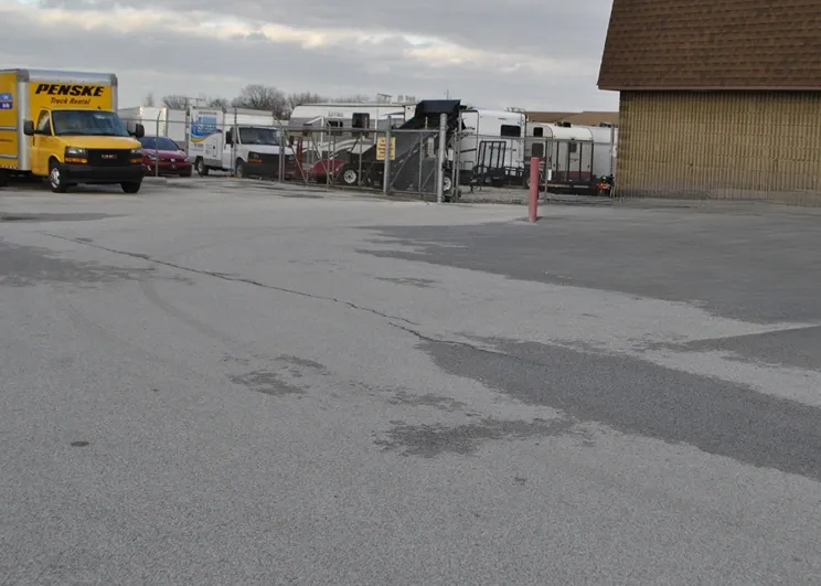 Gated vehicle storage facility.